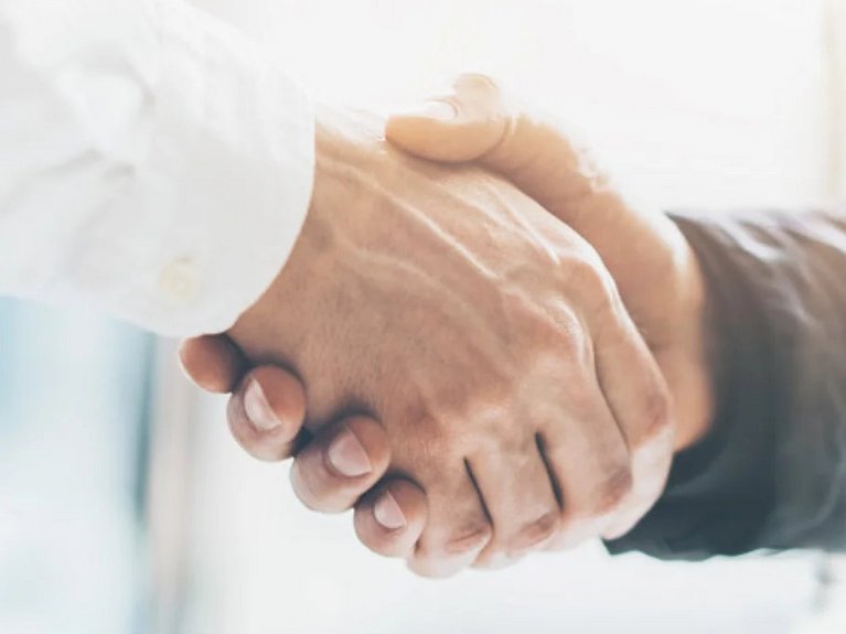 Handshake Two people shaking hands