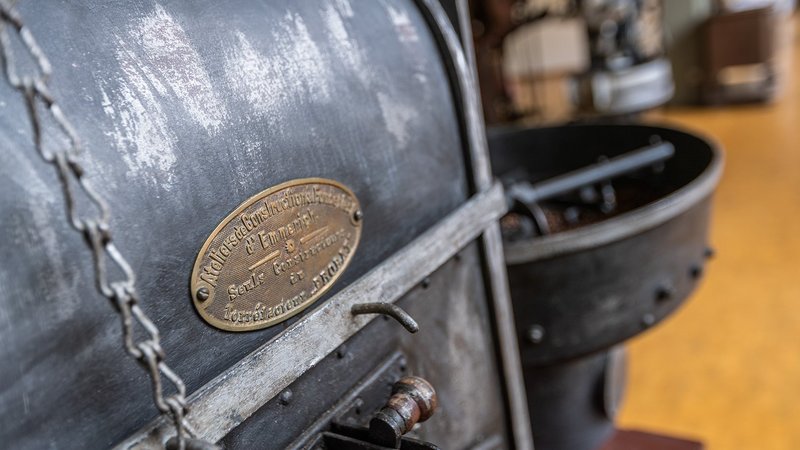 Close up of old drum roaster in museum